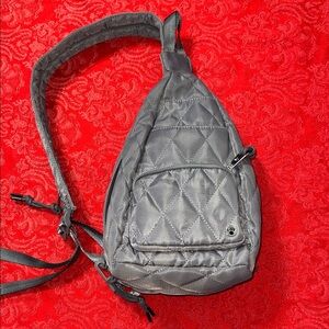 Bearpaw Sporty Convertible Crossbody Backpack/Sling in gray.